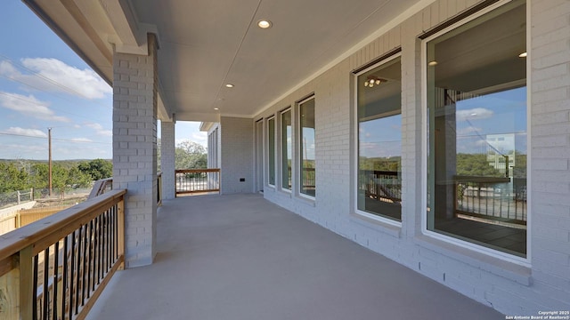 view of patio / terrace with a balcony