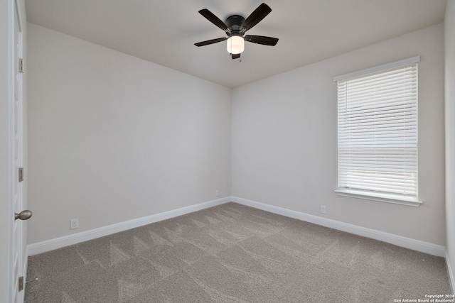 unfurnished room featuring carpet flooring and ceiling fan