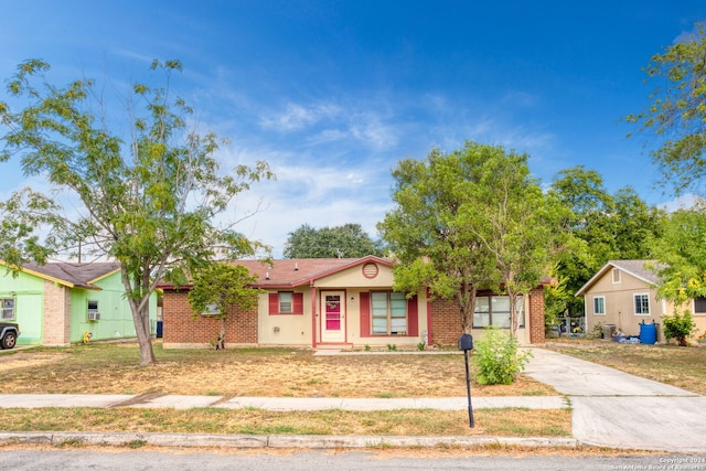 single story home featuring a garage