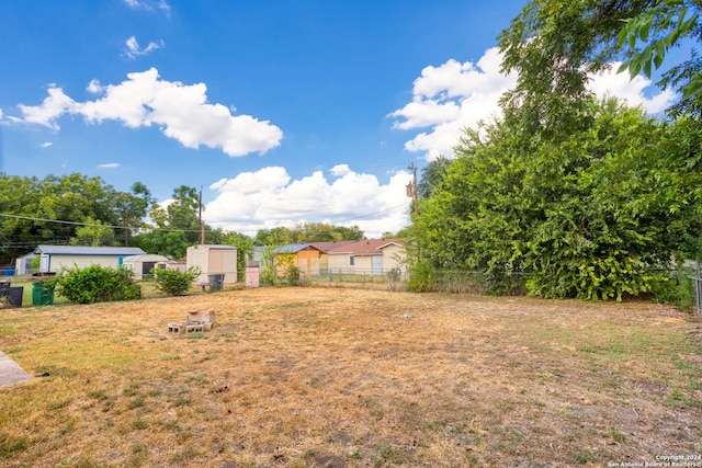 view of yard with fence