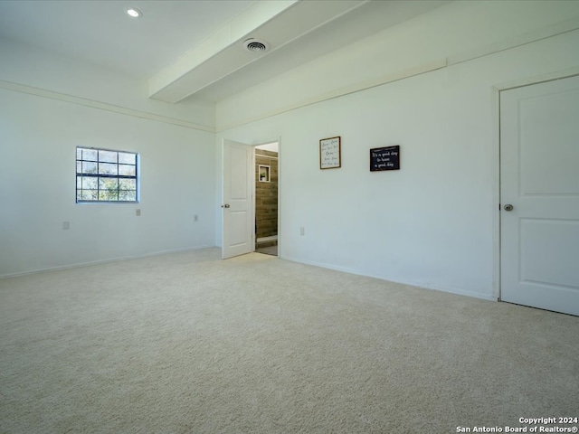 empty room with carpet flooring