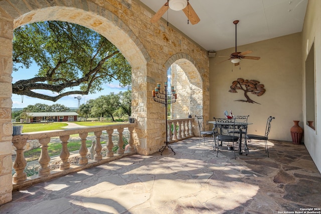 view of patio / terrace featuring ceiling fan and covered porch