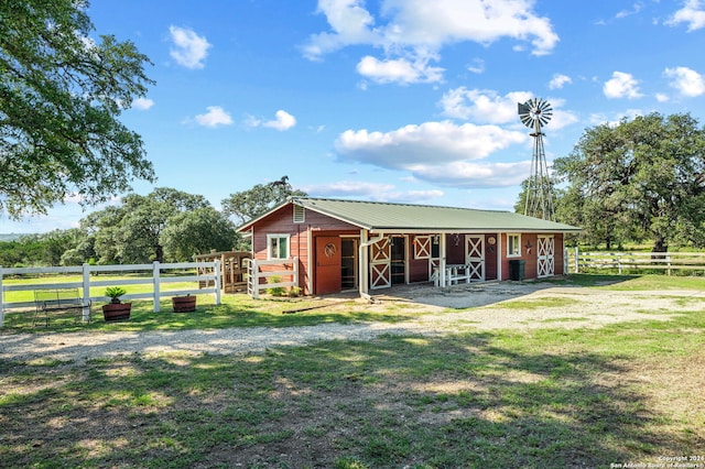 exterior space with a rural view