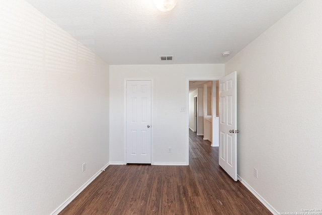 interior space with dark wood-type flooring