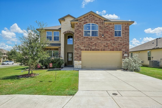 view of front property featuring a garage, a front yard, and cooling unit