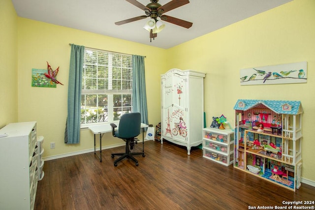 office featuring ceiling fan, baseboards, and wood finished floors