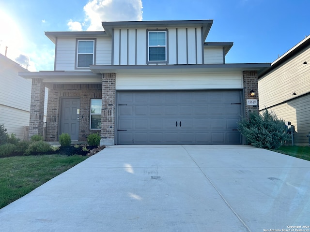 view of front of property with a garage