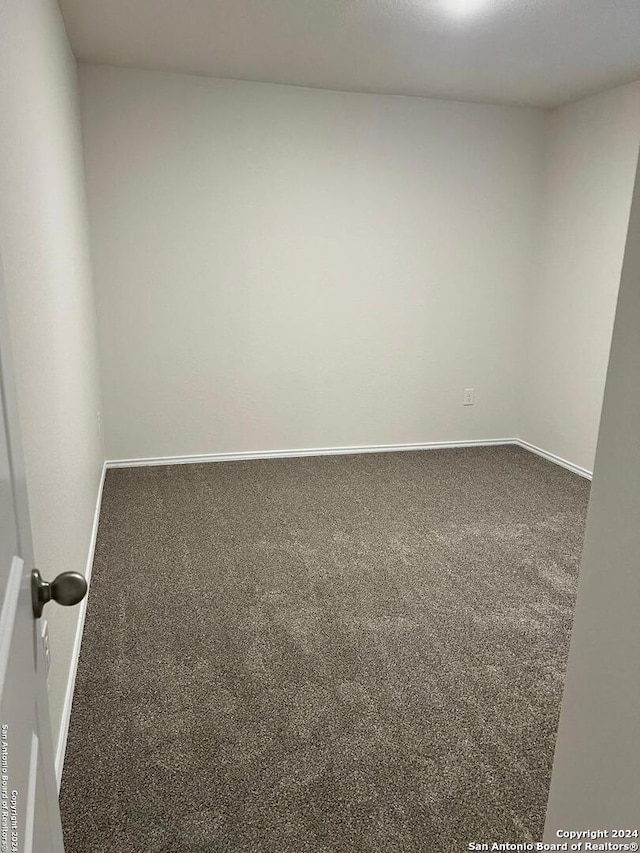 empty room featuring carpet flooring