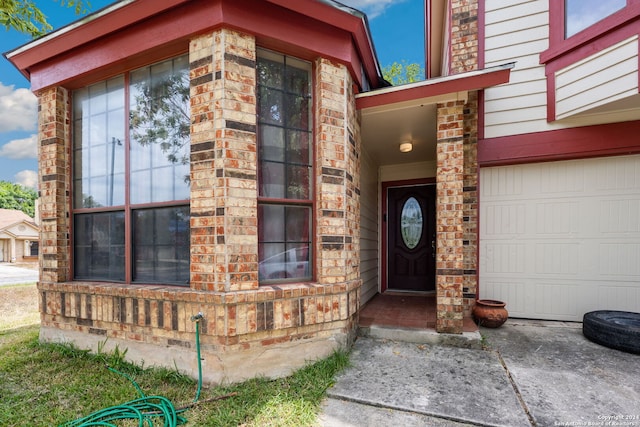 entrance to property with a garage