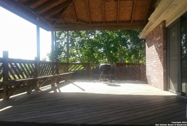 wooden deck with a gazebo