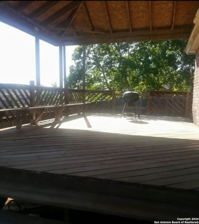 wooden terrace with a gazebo