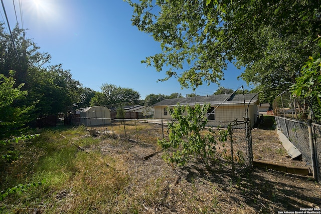 view of yard with a shed