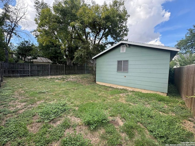 view of yard featuring a fenced backyard