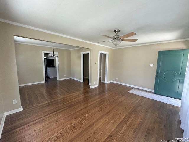 unfurnished room with ceiling fan with notable chandelier, dark wood-type flooring, and ornamental molding