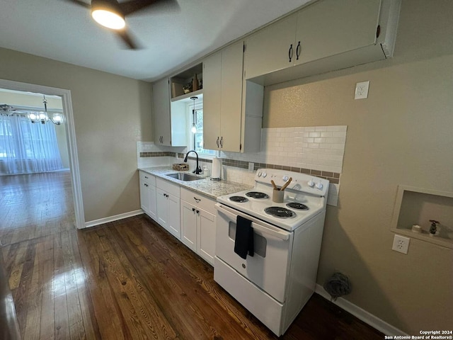 kitchen with white electric range, tasteful backsplash, sink, dark hardwood / wood-style floors, and white cabinets