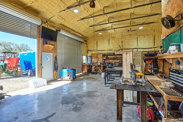 garage with a workshop area