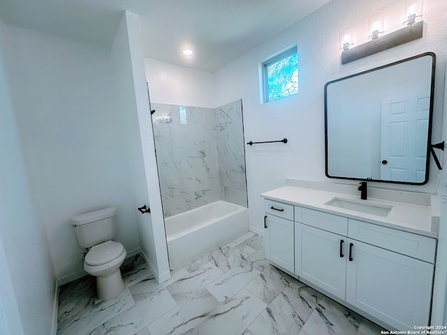 full bathroom with tiled shower / bath, vanity, and toilet