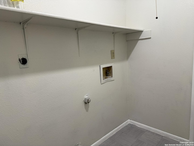 laundry room featuring laundry area, hookup for a washing machine, baseboards, and hookup for an electric dryer