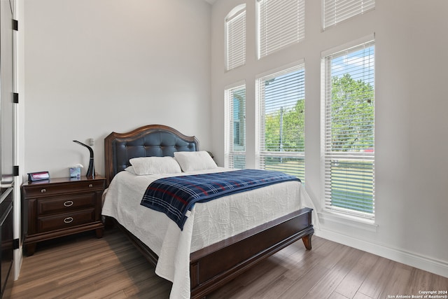 bedroom featuring wood-type flooring