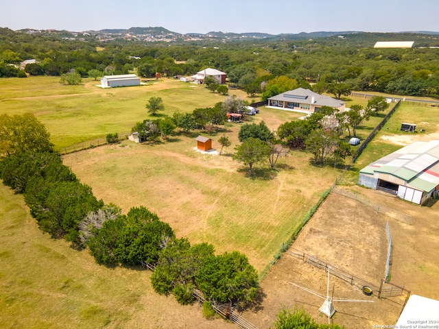 birds eye view of property featuring a rural view