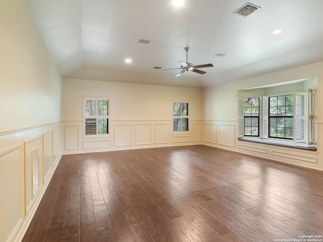 unfurnished living room with ceiling fan, visible vents, recessed lighting, dark wood-style flooring, and lofted ceiling