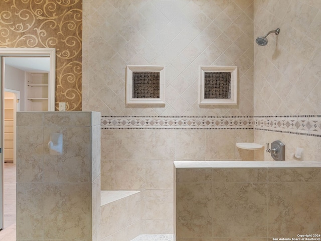 full bath with a walk in shower and visible vents