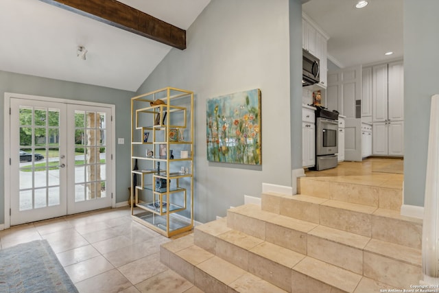 staircase featuring vaulted ceiling with beams, french doors, and tile patterned floors