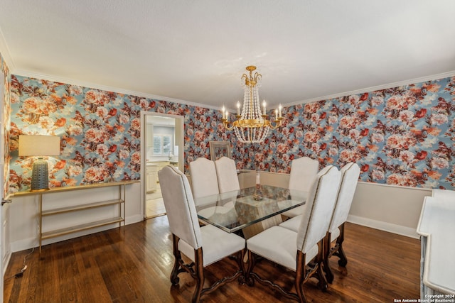 dining area featuring dark wood-type flooring, crown molding, and an inviting chandelier