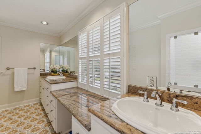 bathroom with vanity, ornamental molding, and a wealth of natural light