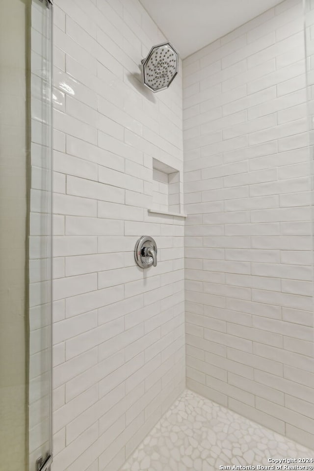 bathroom with an enclosed shower