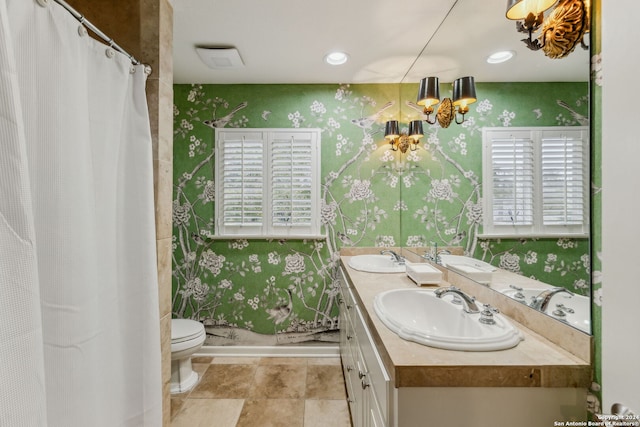 bathroom featuring vanity, toilet, and a shower with shower curtain