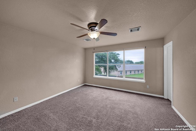 10314 Mustang Rdg, Converse, TX 78109 - carpeted empty room featuring a ceiling fan, a textured ceiling, a textured wall, and baseboards