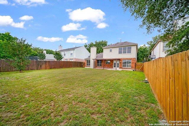 10314 Mustang Rdg, Converse, TX 78109 - back of house with brick siding