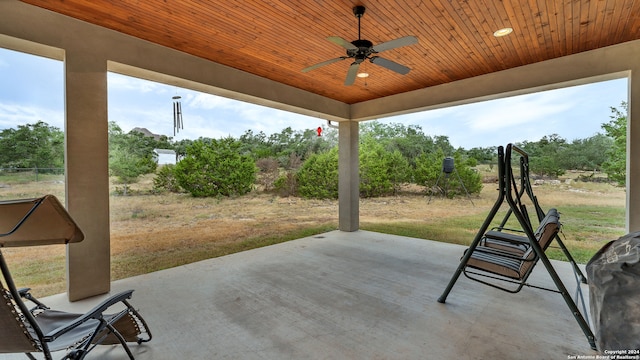 view of patio with ceiling fan