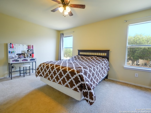 bedroom featuring ceiling fan and carpet flooring