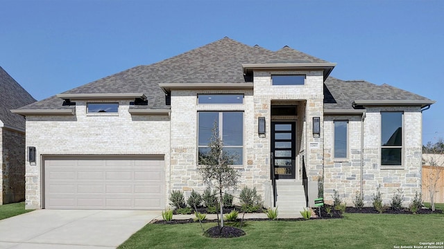 view of front of home featuring a garage, brick siding, concrete driveway, roof with shingles, and a front lawn