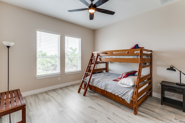 bedroom featuring ceiling fan and light hardwood / wood-style floors