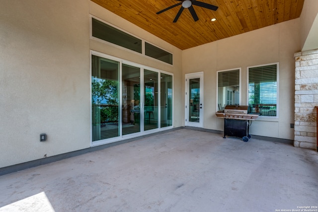 view of patio with grilling area and ceiling fan