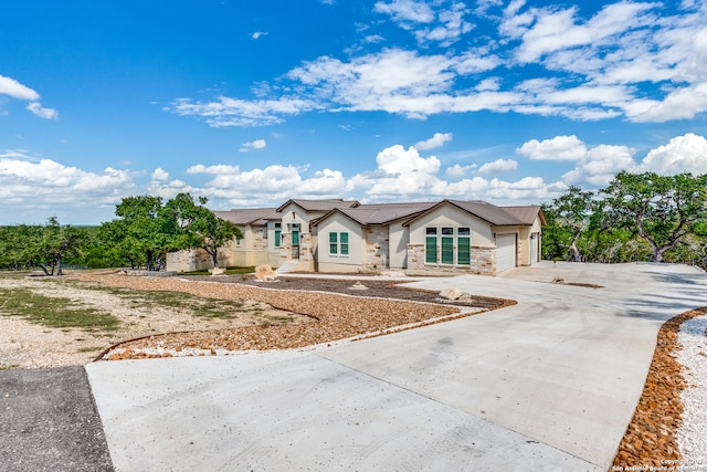 view of front of home with a garage