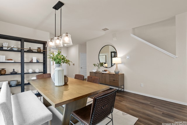 dining area featuring dark hardwood / wood-style flooring