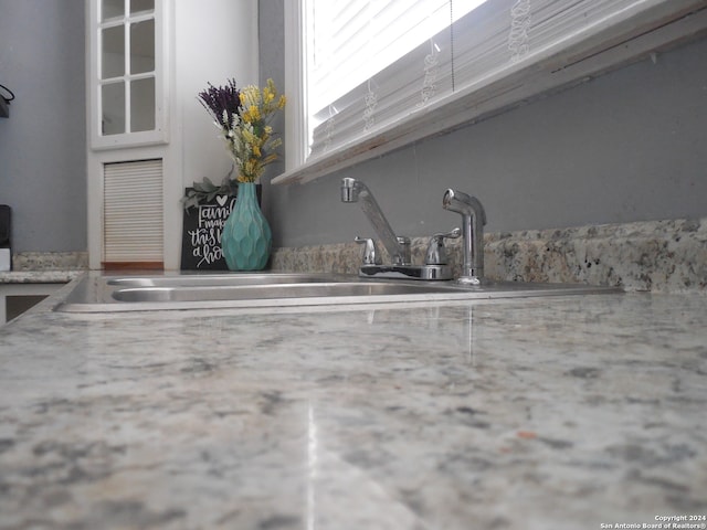 details with light stone counters and sink