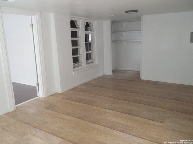 unfurnished room featuring light hardwood / wood-style floors