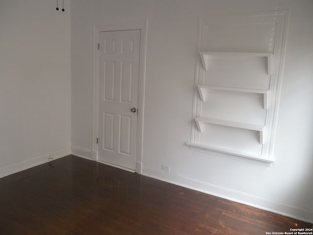 interior space with dark wood-type flooring