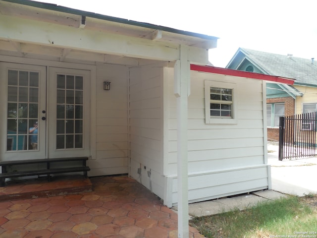 view of side of home with french doors