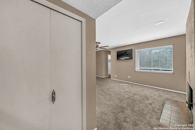 hallway featuring carpet flooring