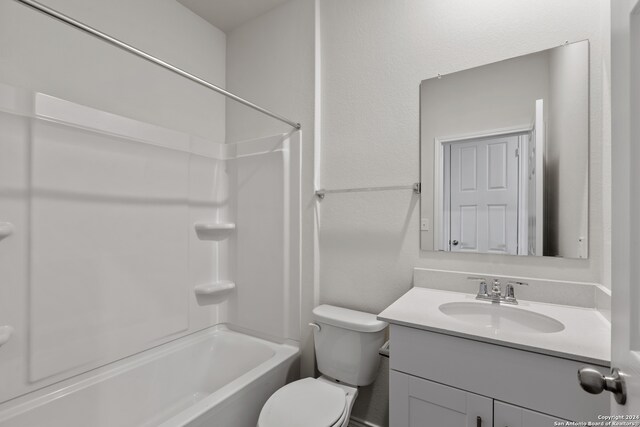 full bathroom featuring vanity, toilet, and shower / bathtub combination