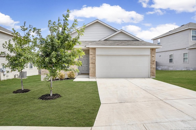 view of front of house with an attached garage, brick siding, driveway, roof with shingles, and a front yard