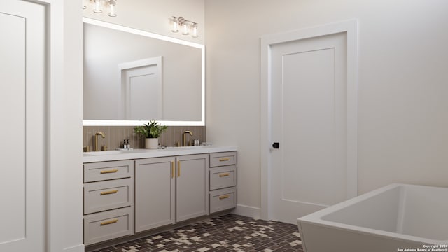 bathroom featuring vanity, tile patterned flooring, and a bathtub