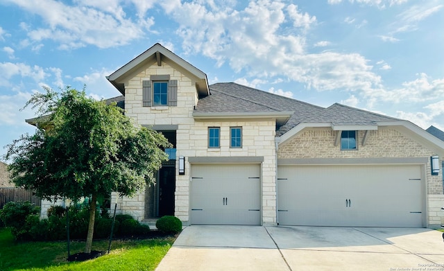 front of property with a garage