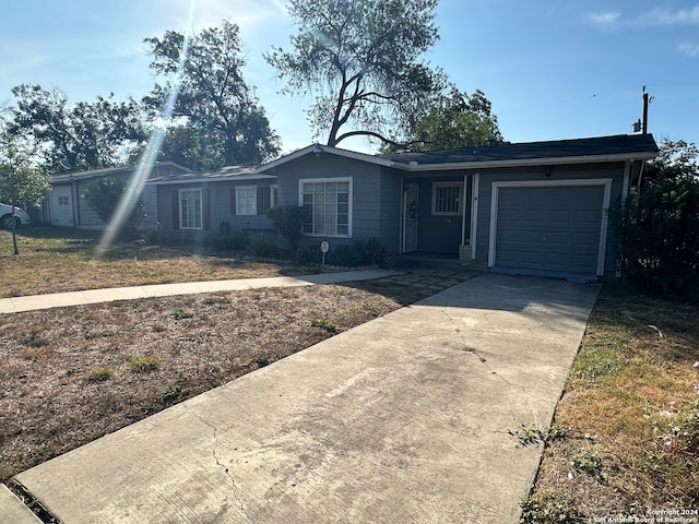 single story home with a garage